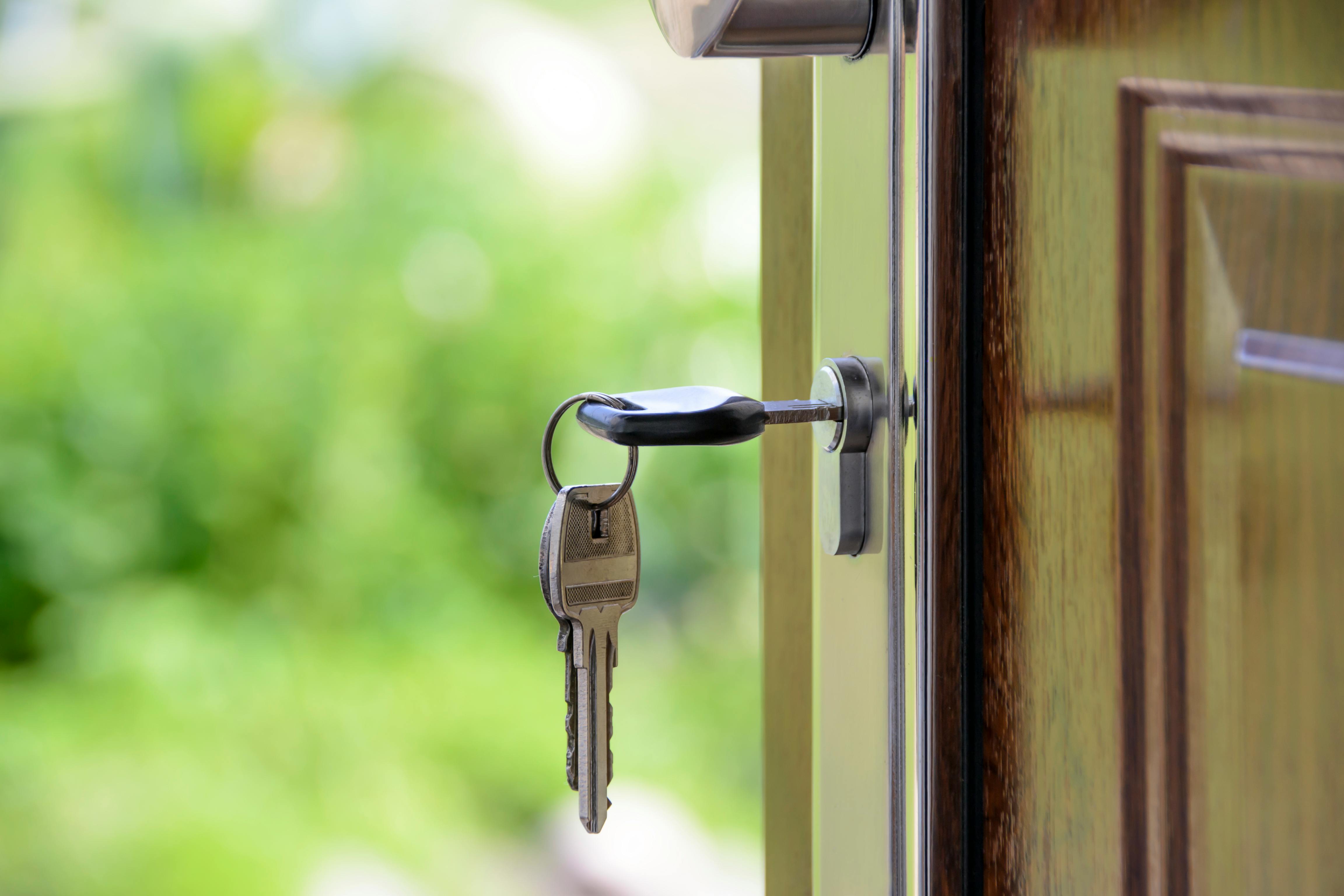 Keys in a front door — start your property business